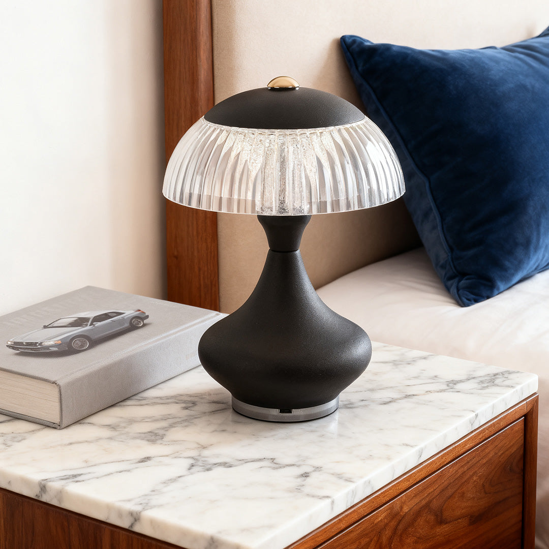 Cordless black table unique lamps styled on a marble nightstand, providing a cozy bedside light.