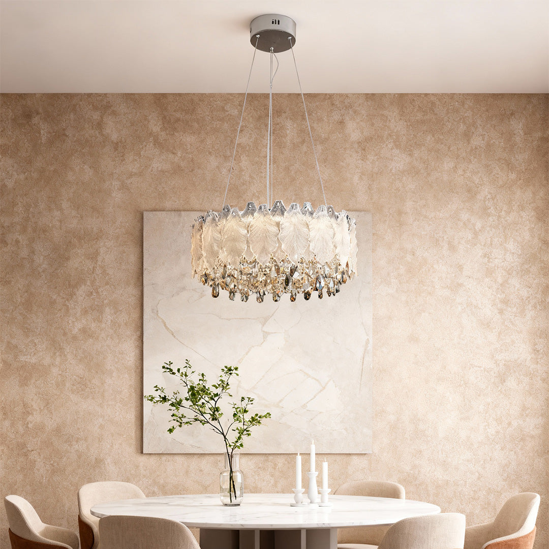 Country French chandelier in beige-toned dining area with minimalist wall decor.