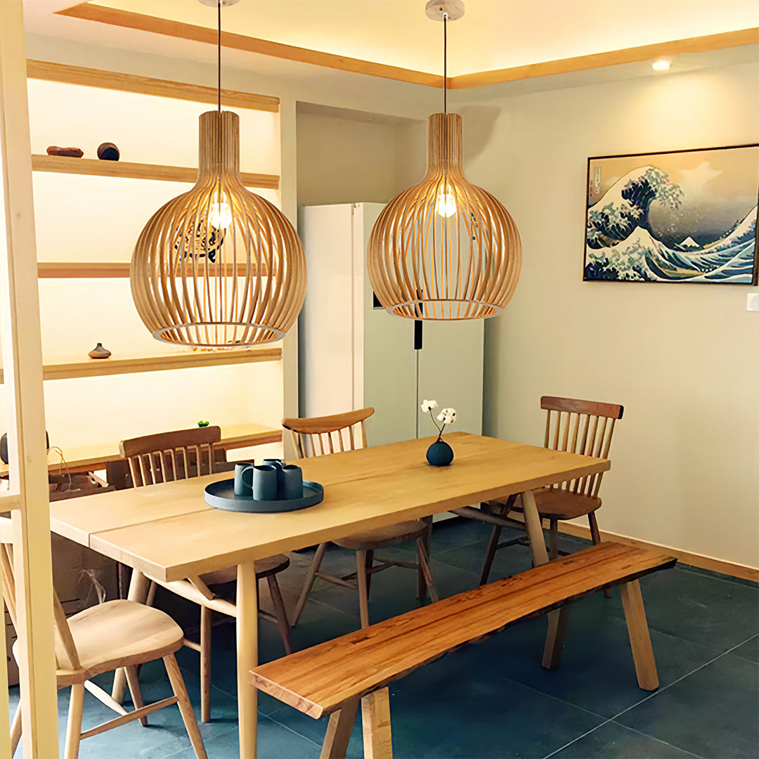 Wooden bird cage pendant light in a cozy dining area, warm and inviting lighting design