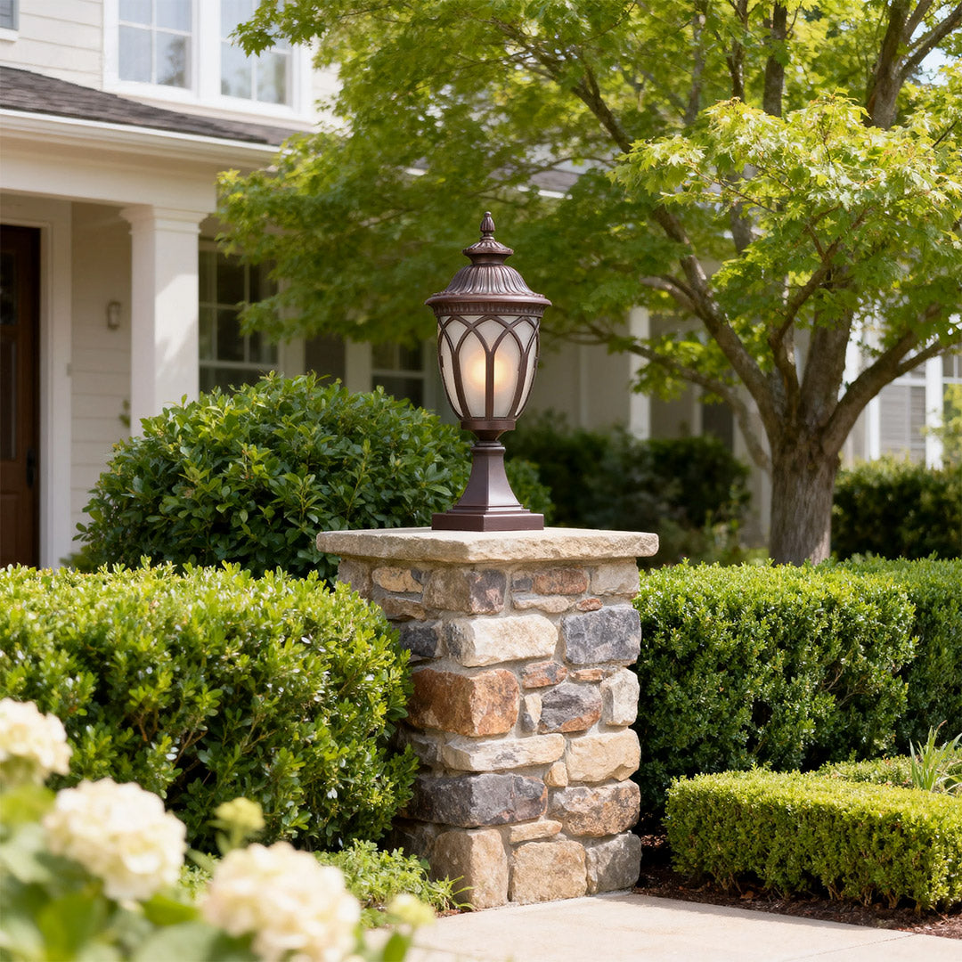 Garden pillar light in a cozy garden entrance, warm and inviting outdoor lighting fixture