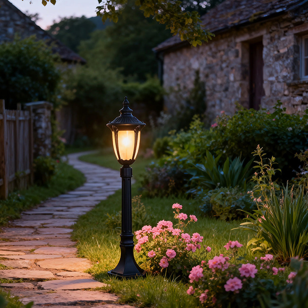 Bollard light for garden in a cozy garden pathway, warm and inviting outdoor lighting fixture