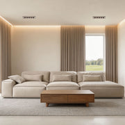 Cozy living room with led ceiling recessed spotlights accentuating the modern design.