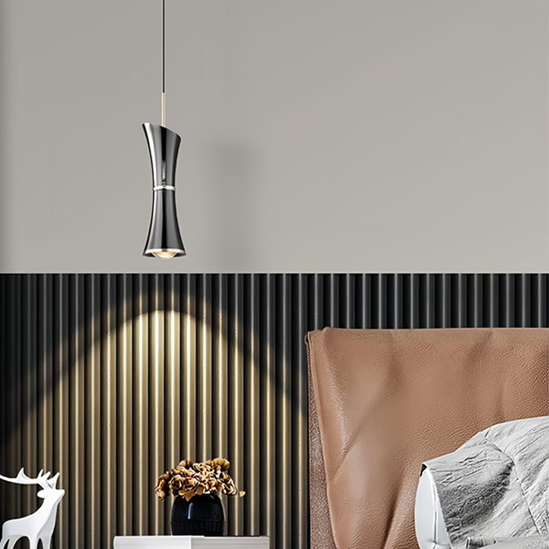 Cozy living room setup with small black pendant light providing focused task lighting