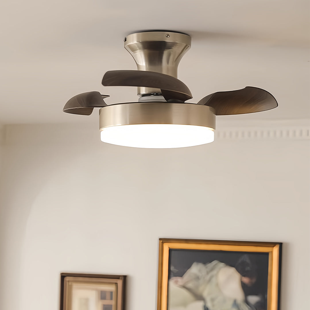 Silver ceiling fan with light in a cozy living room, elegant and functional indoor fixture