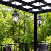 Pendant outdoor light in a cozy outdoor dining area, elegant and functional exterior lighting