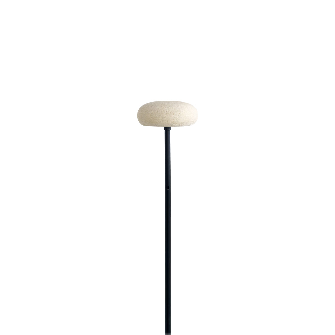 Soft cream mushroom pathway light designed for outdoor landscapes with a minimal look.