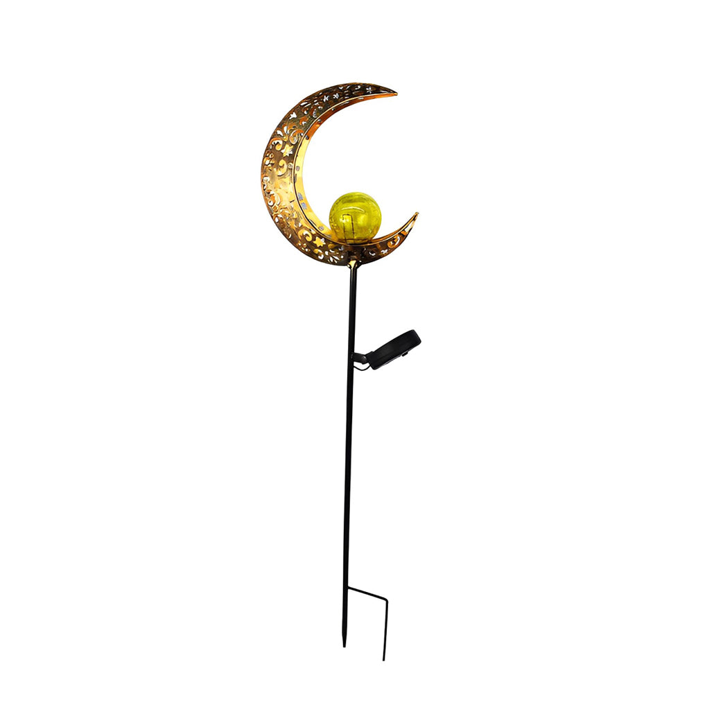 Crescent moon solar garden stake light with a decorative metal shade and attached solar panel.