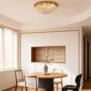 Crystal ceiling lights flush mount illuminating bright dining room with round table and contemporary furnishings