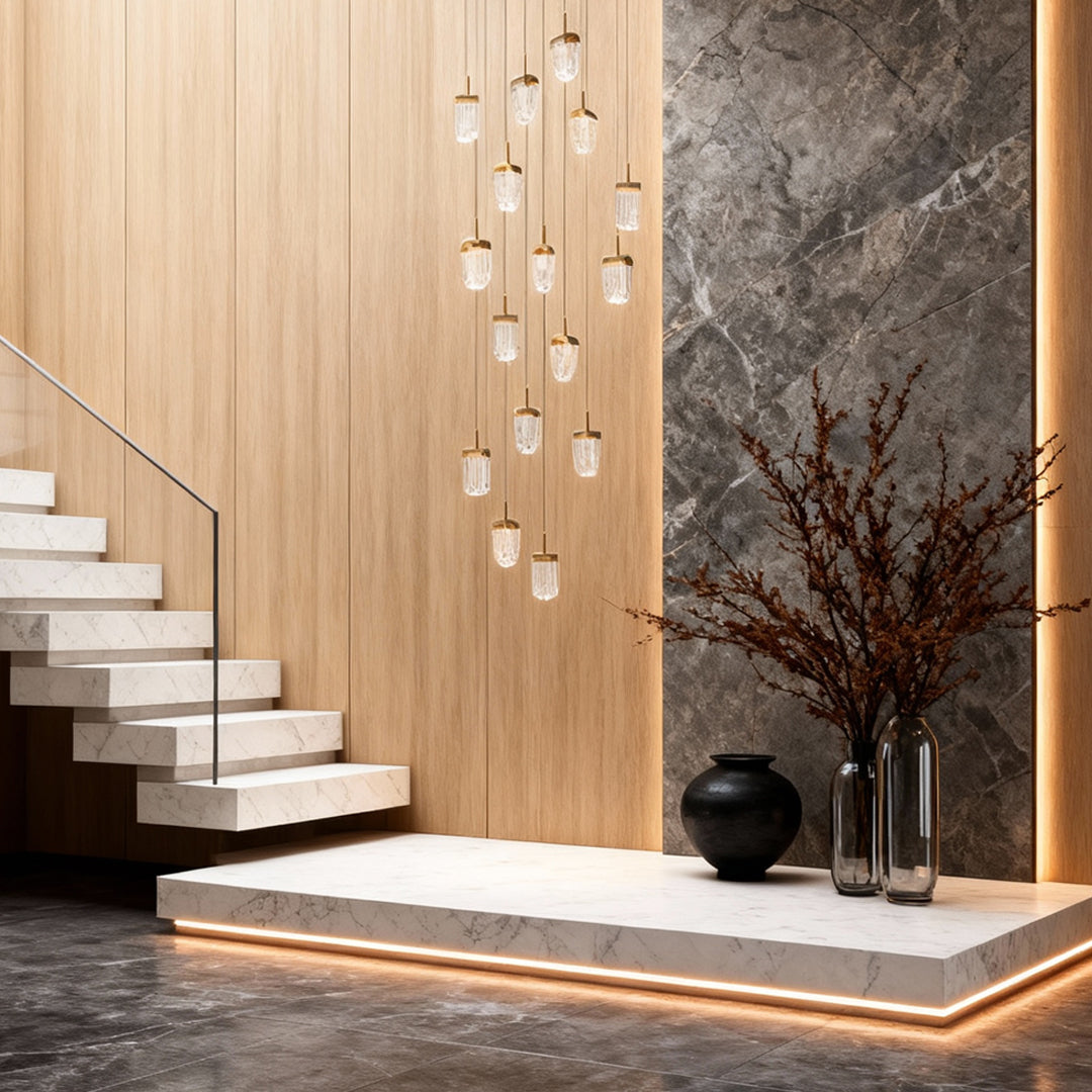 Crystal ceiling lights flush mount cascading along stairwell with wood paneling and dramatic natural stone accent wall