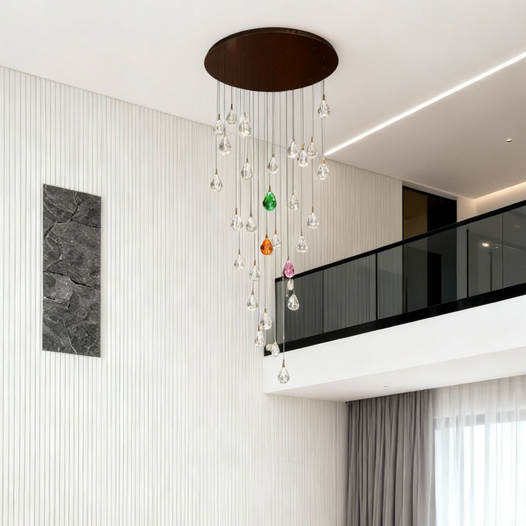 Crystal chandelier for staircase suspended in bright modern entryway with floating stairs and minimalist white interior design