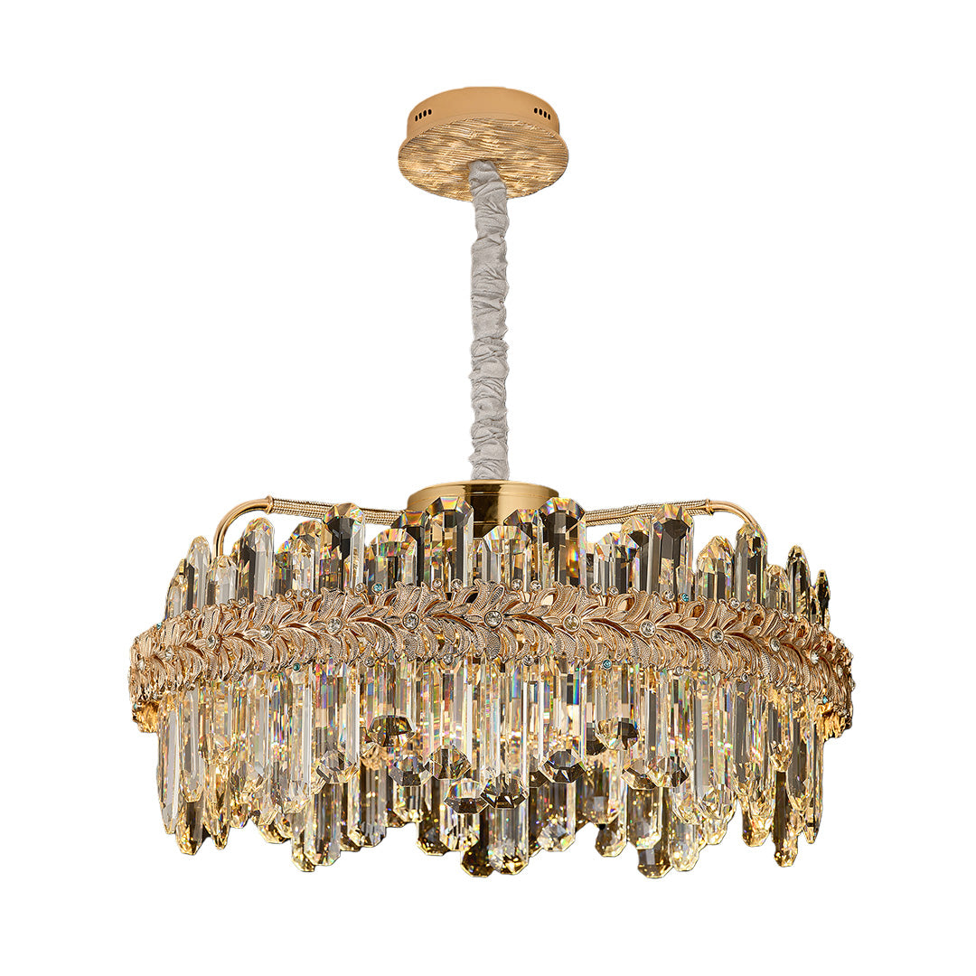 Chandelier lamp with crystal pendants and gold trim, reflecting luxury style.