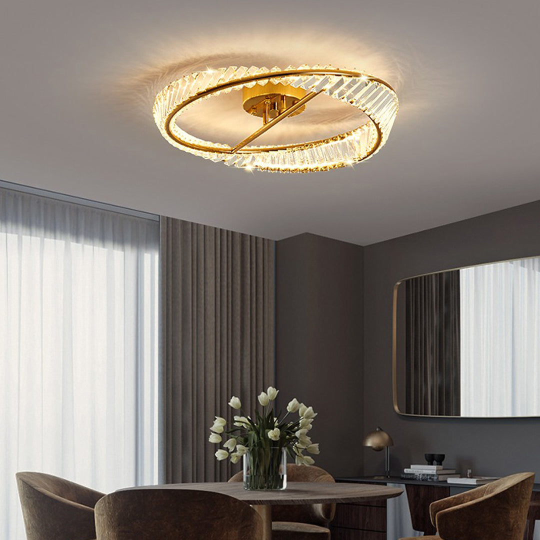Mobius light fixture with premium gold finish and crystal elements providing elegant room illumination