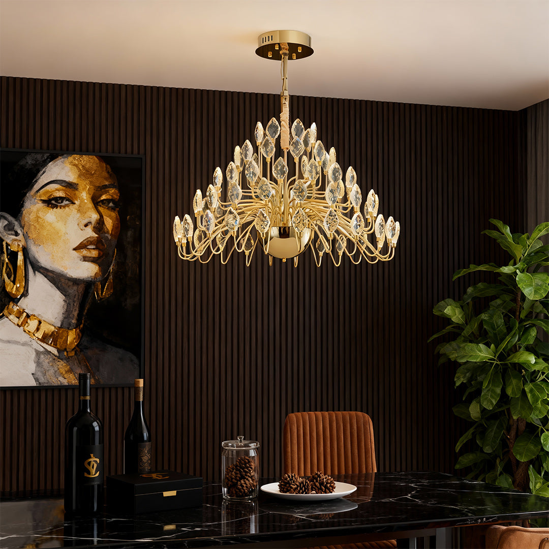 Crystal gold LED chandelier lighting up a luxury dining room.