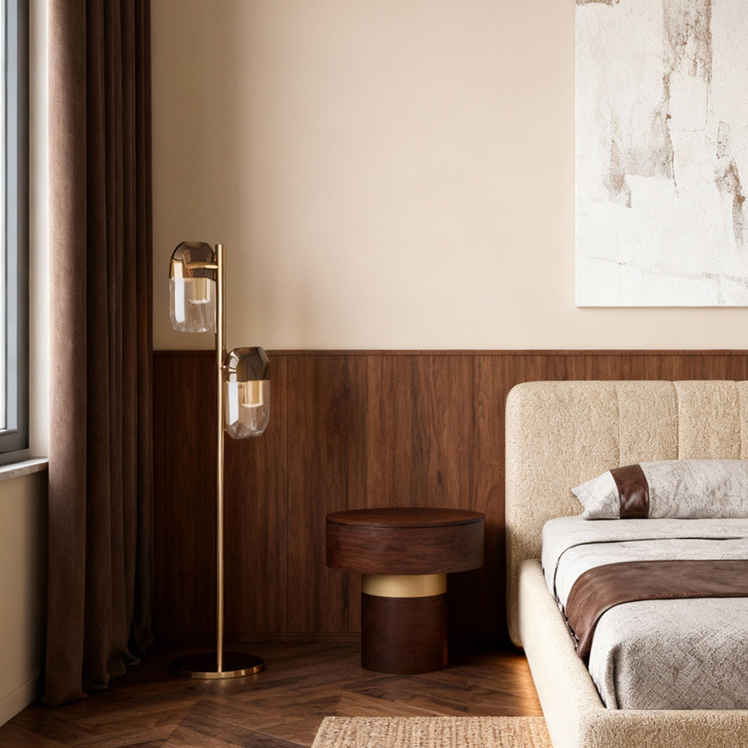 Crystal lamp floor creating accent lighting beside bed with rich wood headboard in elegant neutral bedroom