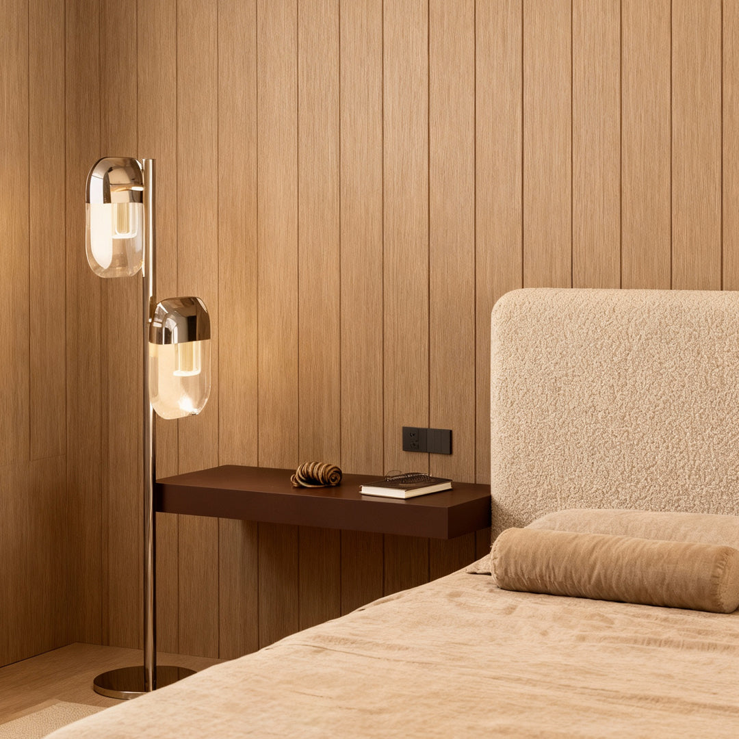 Crystal lamp floor illuminating bedroom corner beside wooden headboard with warm ambient glow in contemporary space