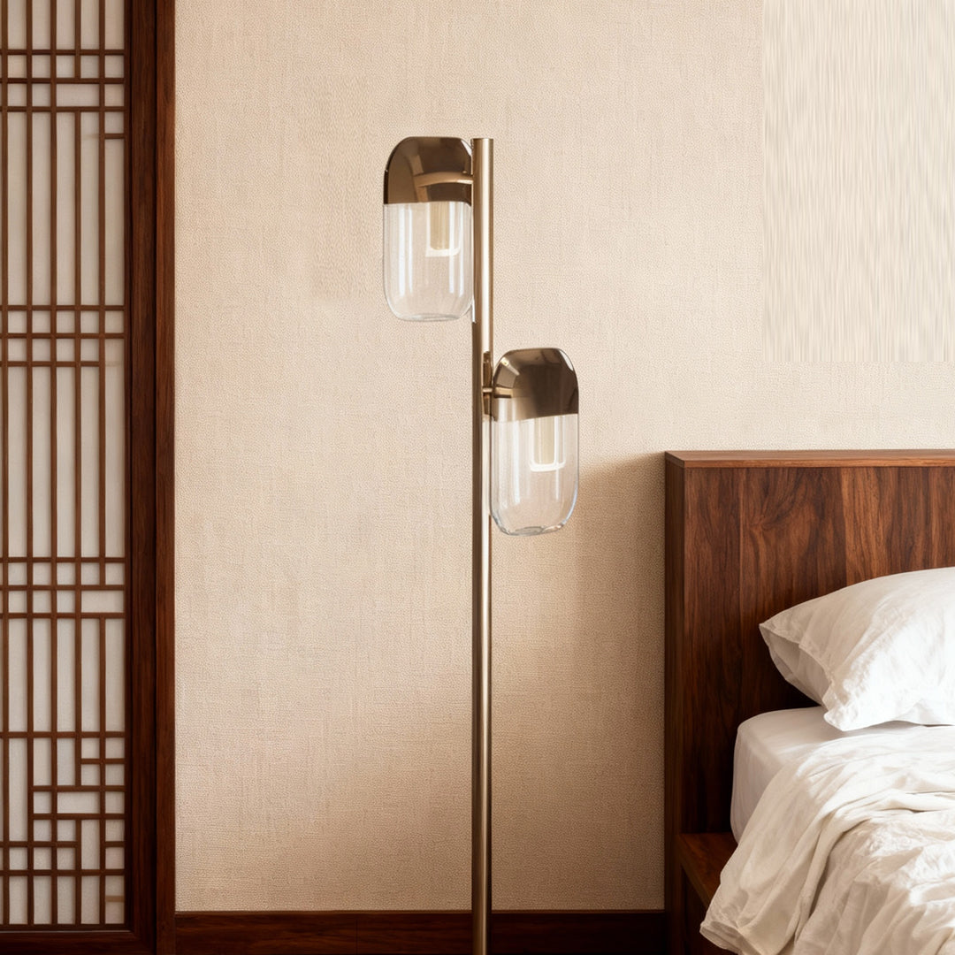 Crystal lamp floor standing beside bed with dark wood headboard and decorative screen in serene bedroom setting