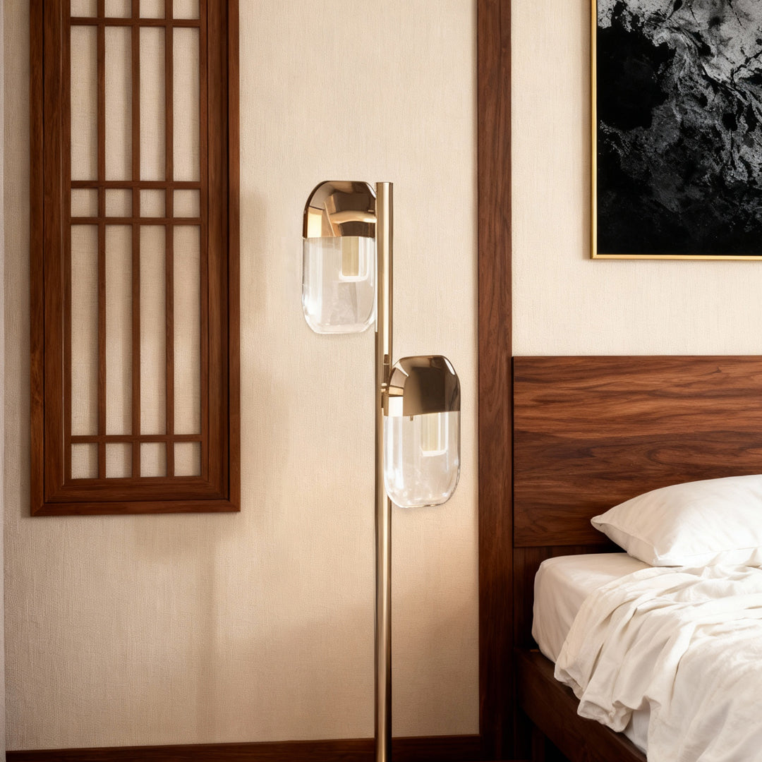 Crystal lamp floor providing reading light beside bed with Japanese-style screen and traditional wood furniture
