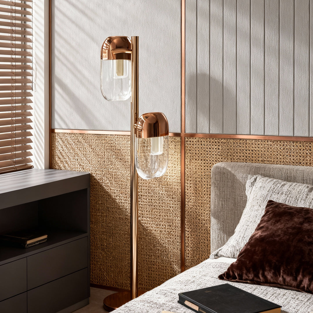 Crystal lamp floor positioned near window in textured bedroom with woven wall panels and natural materials