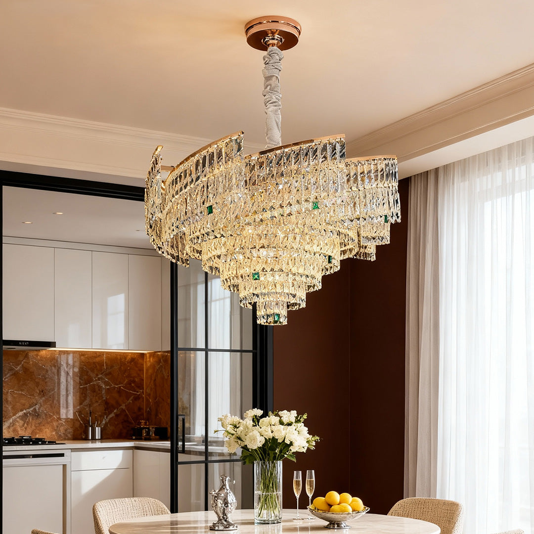 Designed with carbon steel and shimmering crystal details, this crystal pendant chandelier adds refined luxury to modern interiors.
