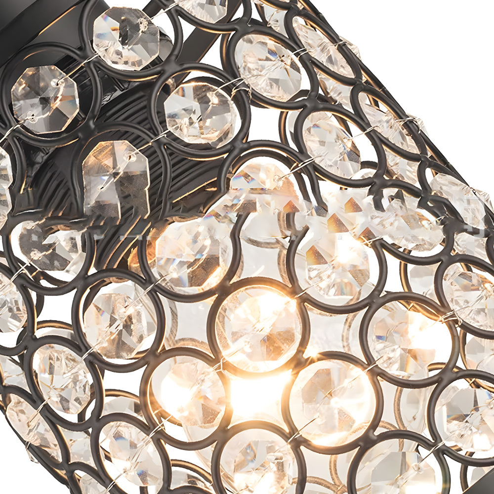 Close-up of crystal pendant light shade with faceted crystals.