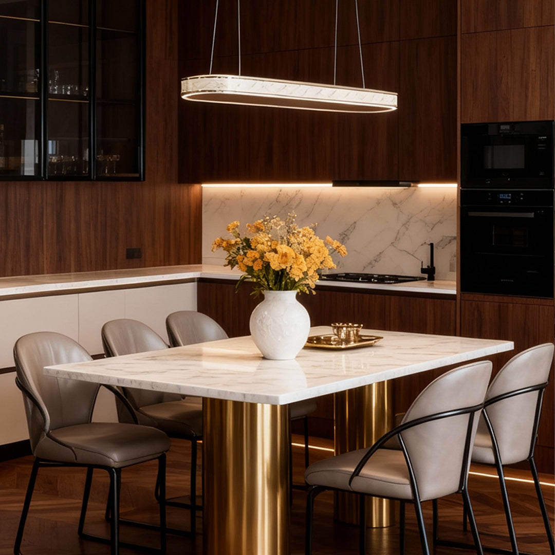 Crystal-accent contemporary linear pendant light above a dining table in a sophisticated modern dining room.