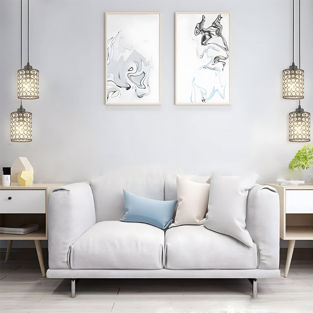 Crystal pendant lights creating ambient lighting in living room.