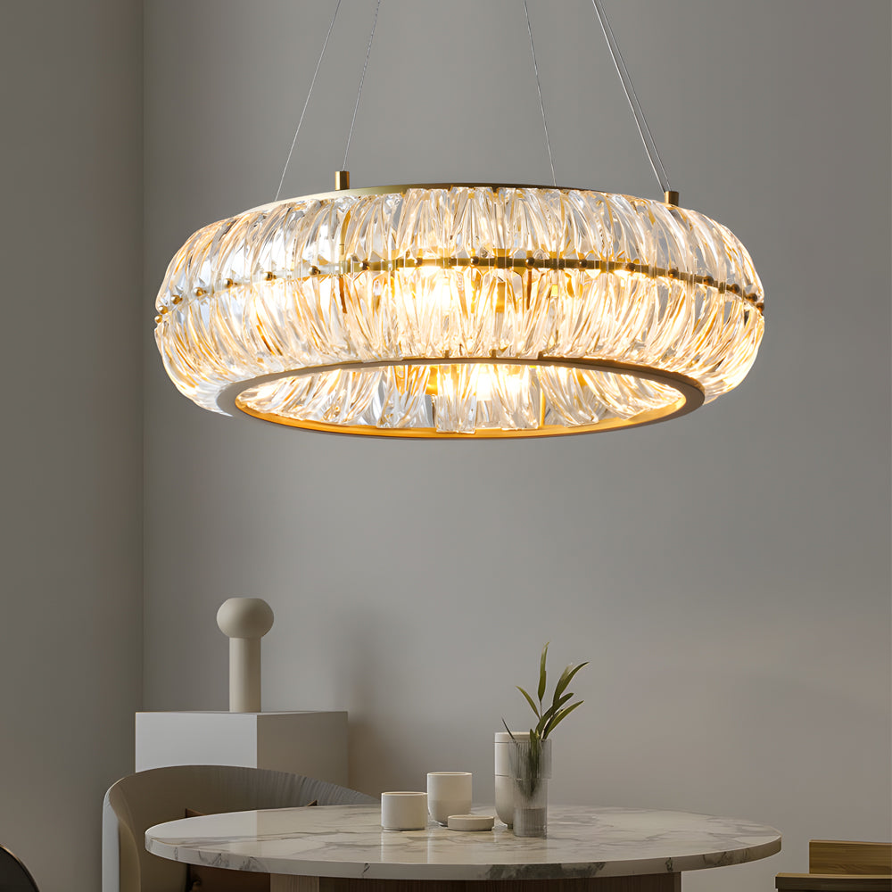 Crystal ring chandelier with a golden frame, providing elegant lighting in a modern kitchen.