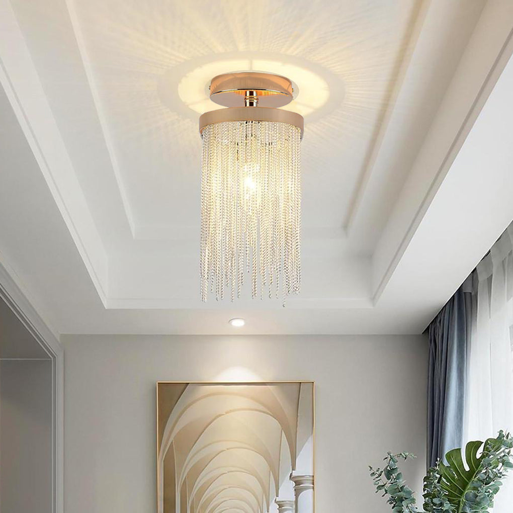 Crystal tassel chandelier flush mount installed in a modern living space with a recessed ceiling and soft neutral decor.