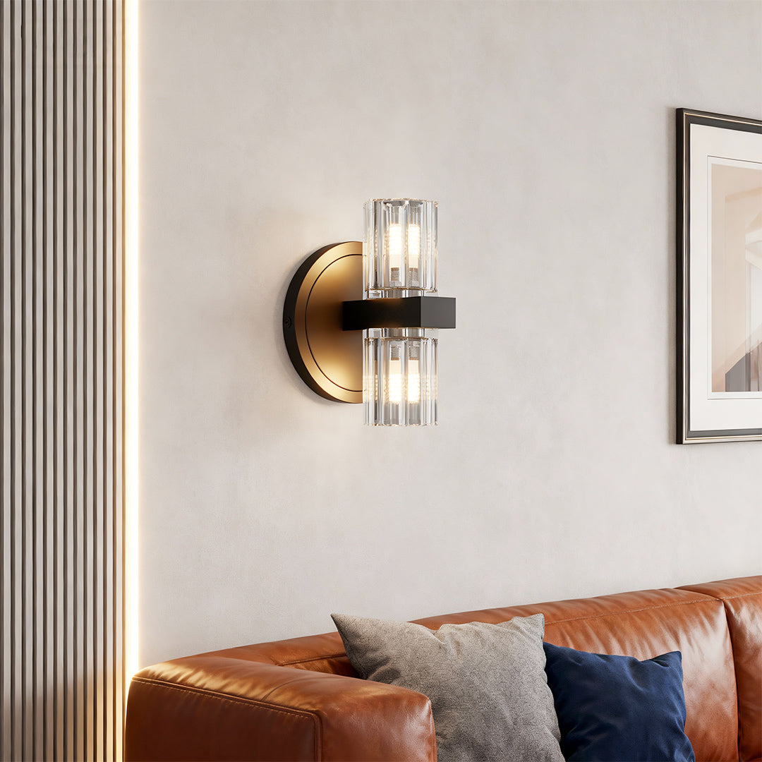 Modern luxury chandeliers style crystal wall light above leather sofa in contemporary living room