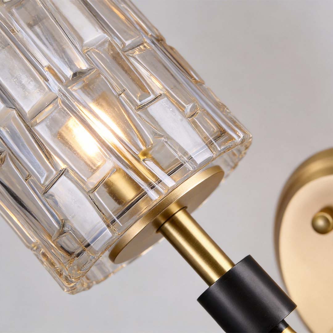 Crystal wall lights gold with a modern design, enhancing a luxurious interior space.