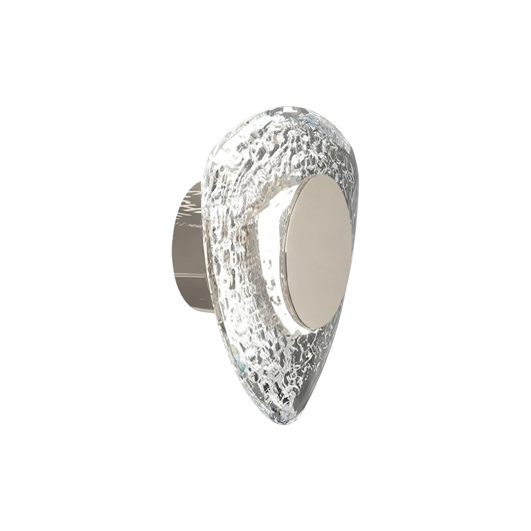 Crystal wall sconce light fixture with vertical arrangement of textured circular glass elements in polished chrome