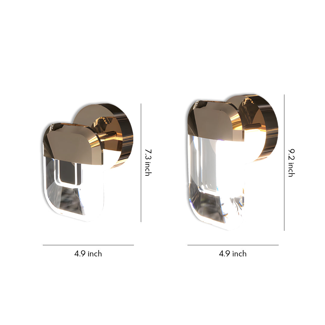 Crystal wall sconce lighting with rectangular glass shade and curved bronze metal accent in contemporary design