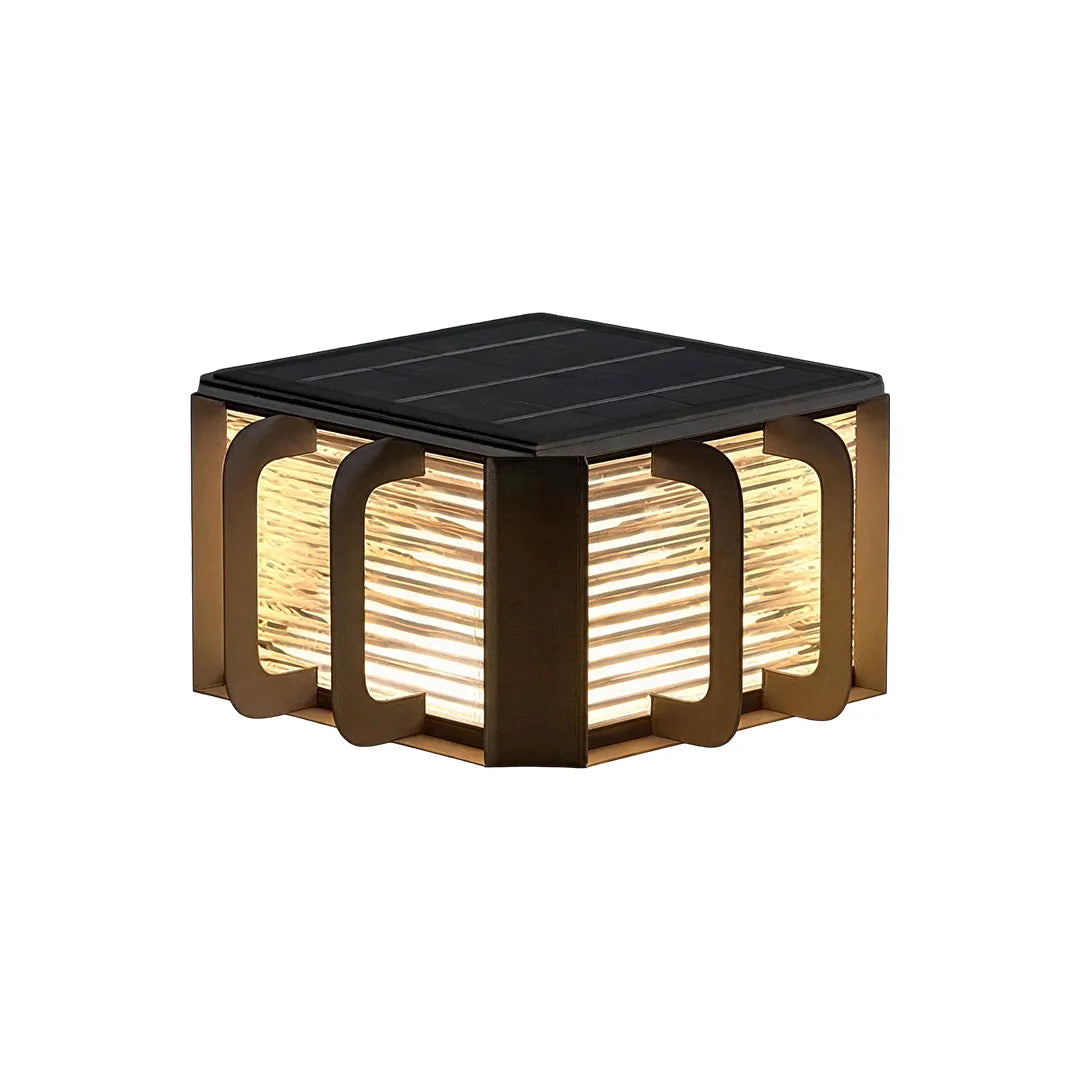 Outdoor solar pillar lights with a modern cube design and decorative illuminated side panels.