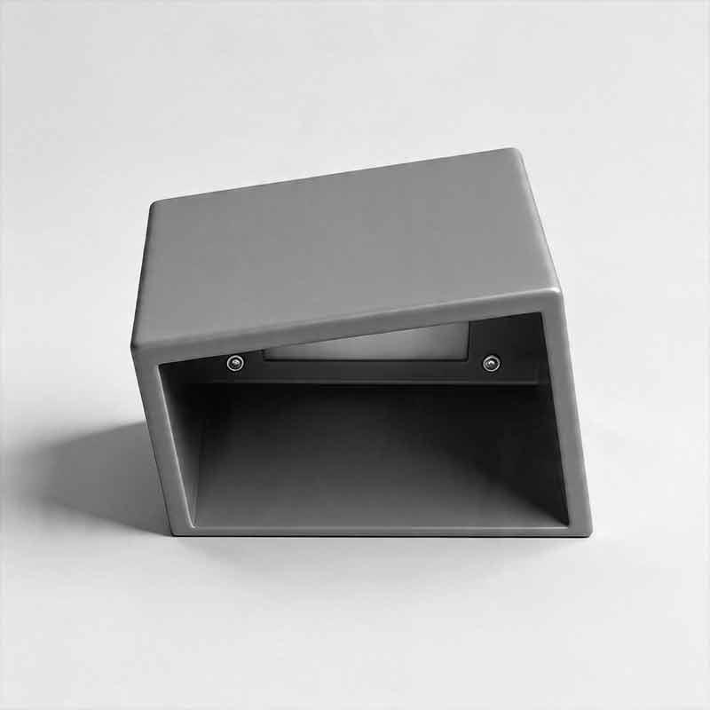 Outdoor cube path light with geometric design provides ambient LED lighting for safety and aesthetic appeal in any landscape.