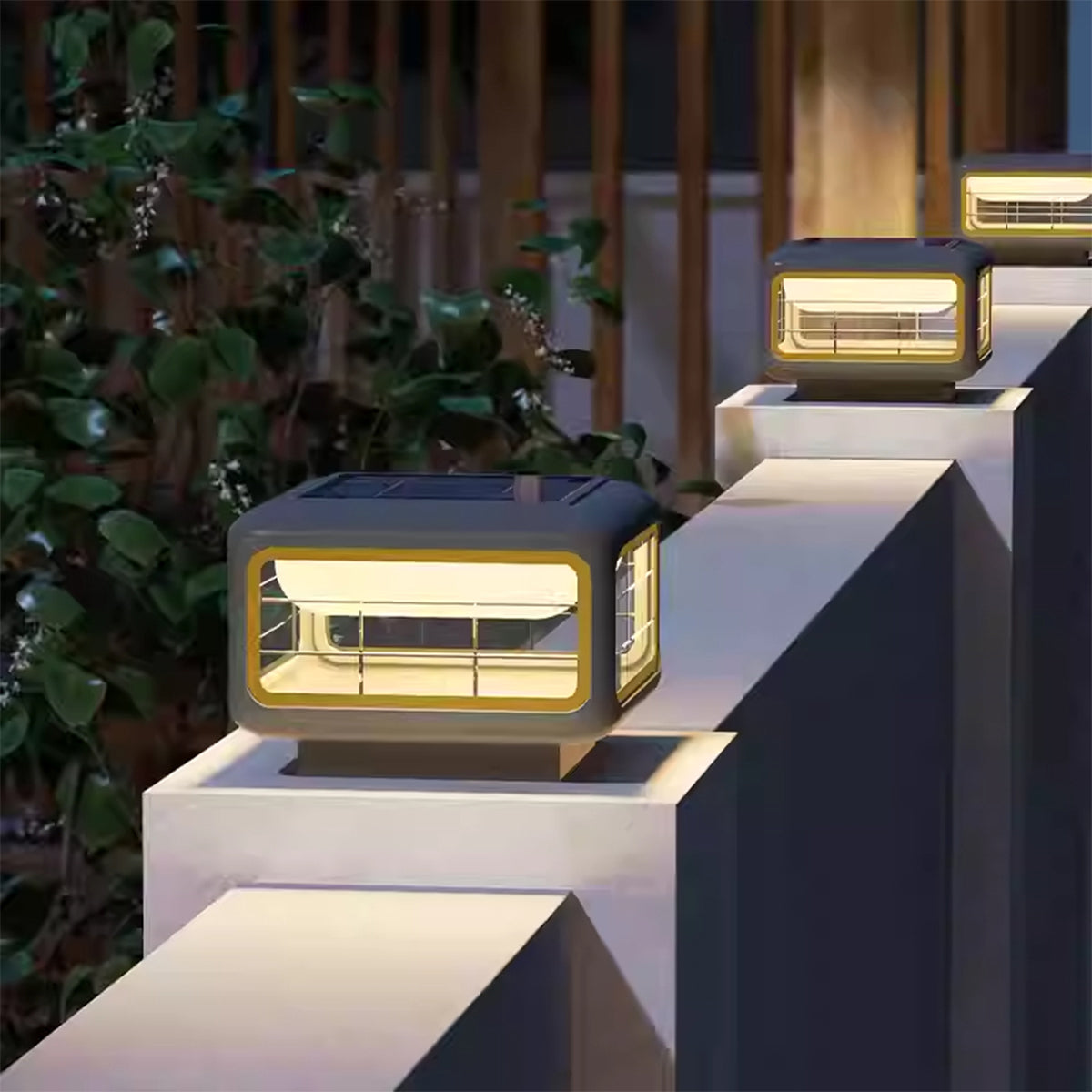 Modern cube-shaped outdoor light fixture mounted on contemporary architectural element