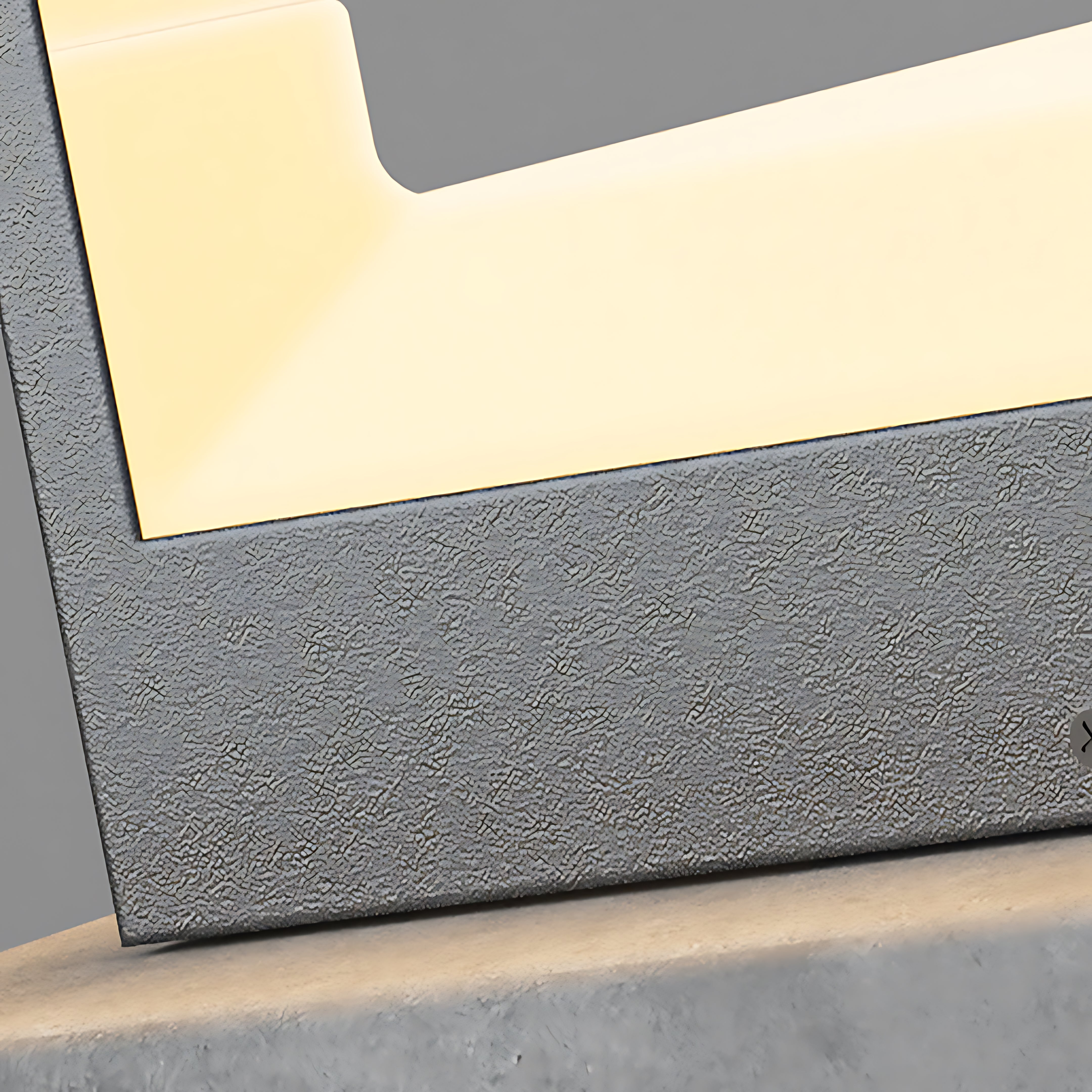 Modern cubic bollard light positioned on textured concrete surface demonstrating clean minimalist design aesthetics