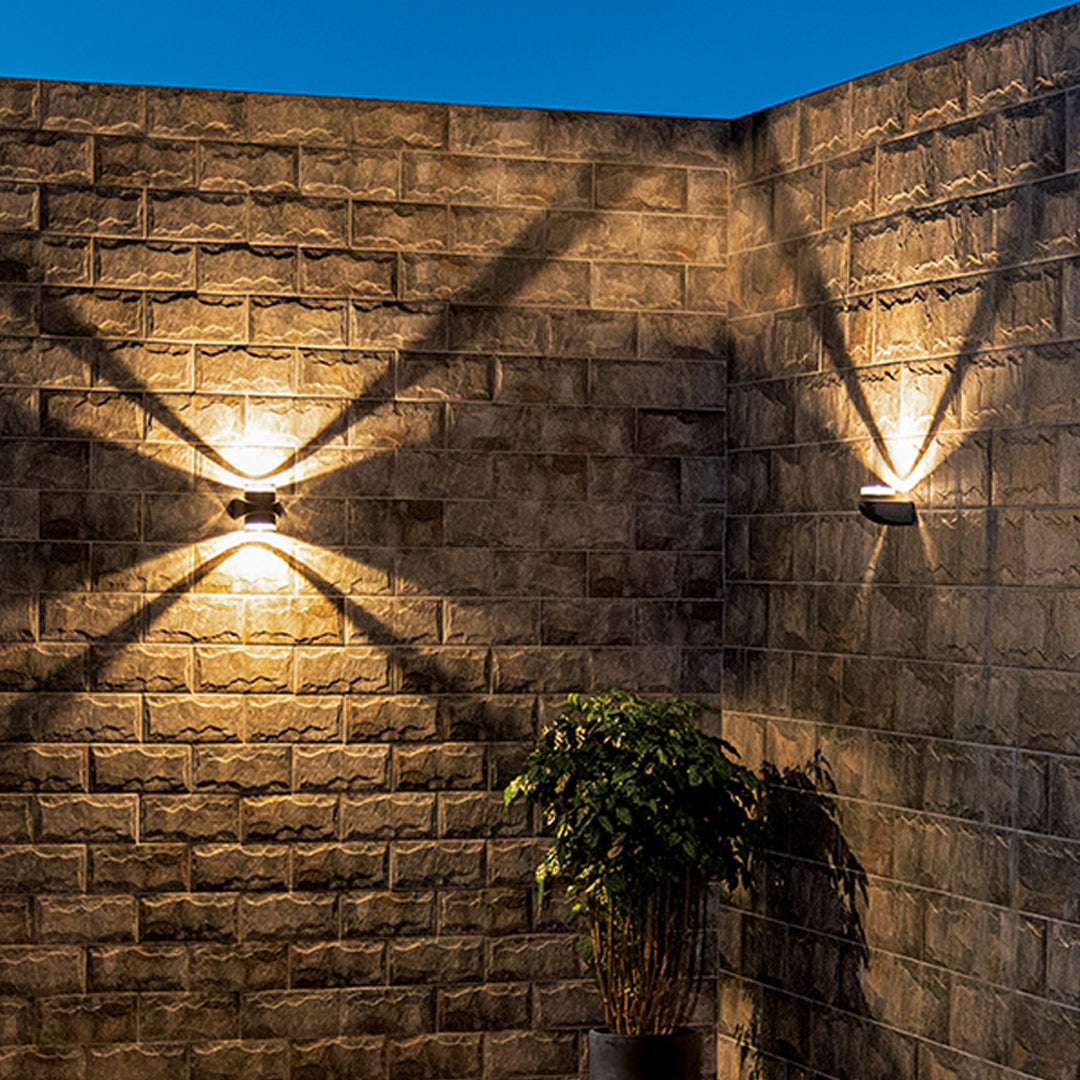 Sleek black angular wall light fixture with modern minimalist aesthetic