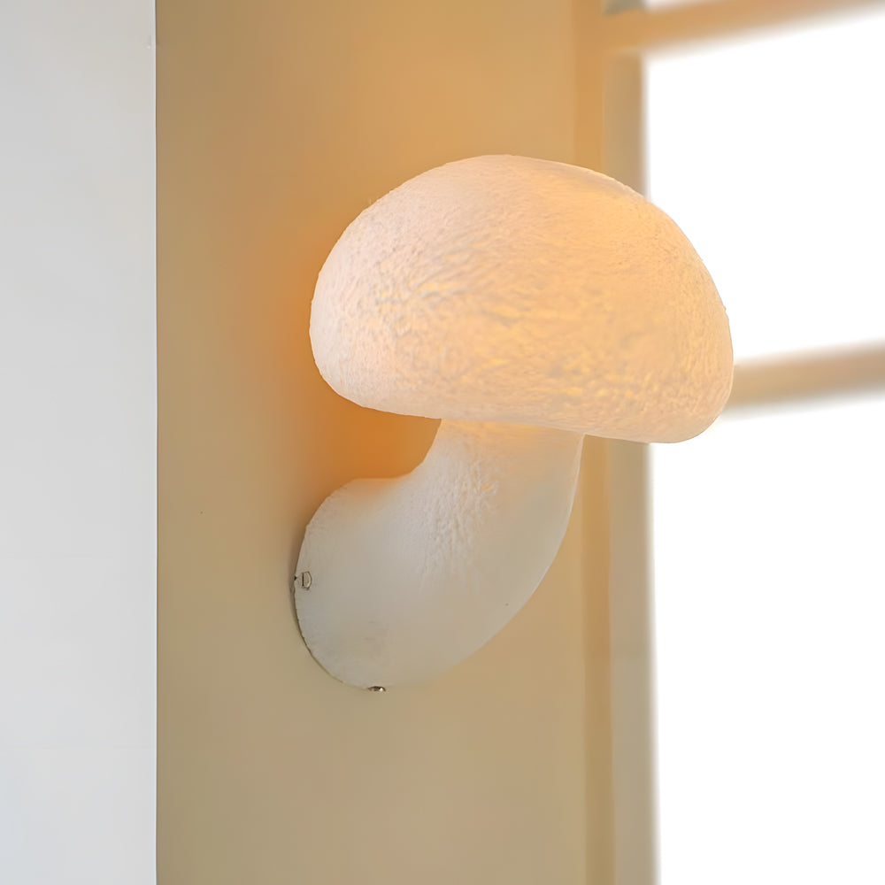 Contemporary curved LED wall lights with organic design providing soft illumination in modern hallway with warm wood accents