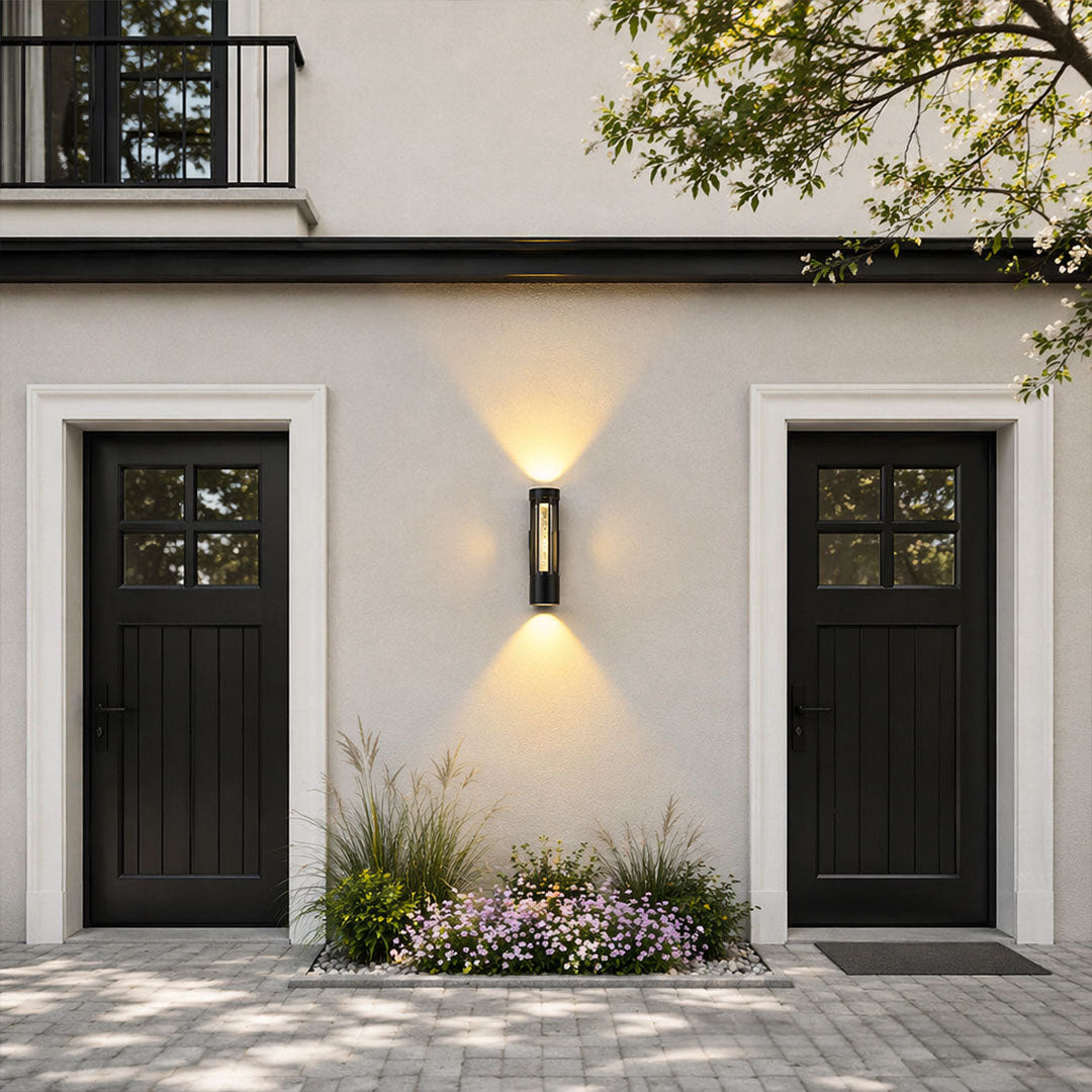 Black cylinder outdoor wall light