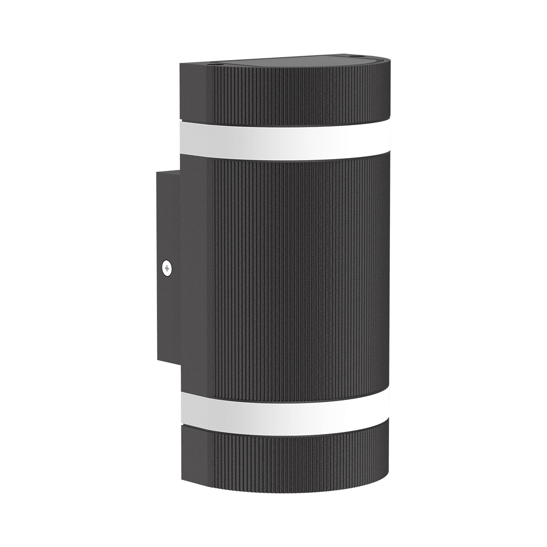 Cylindrical black garden wall light with grooved texture and up-down illumination