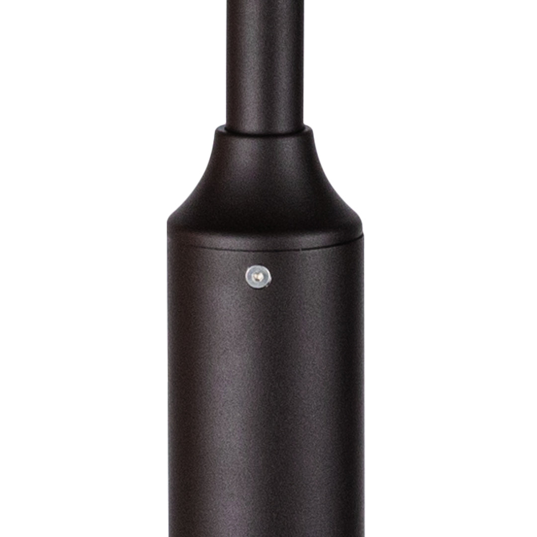 Black cylindrical bollard post component with textured finish for outdoor lighting applications