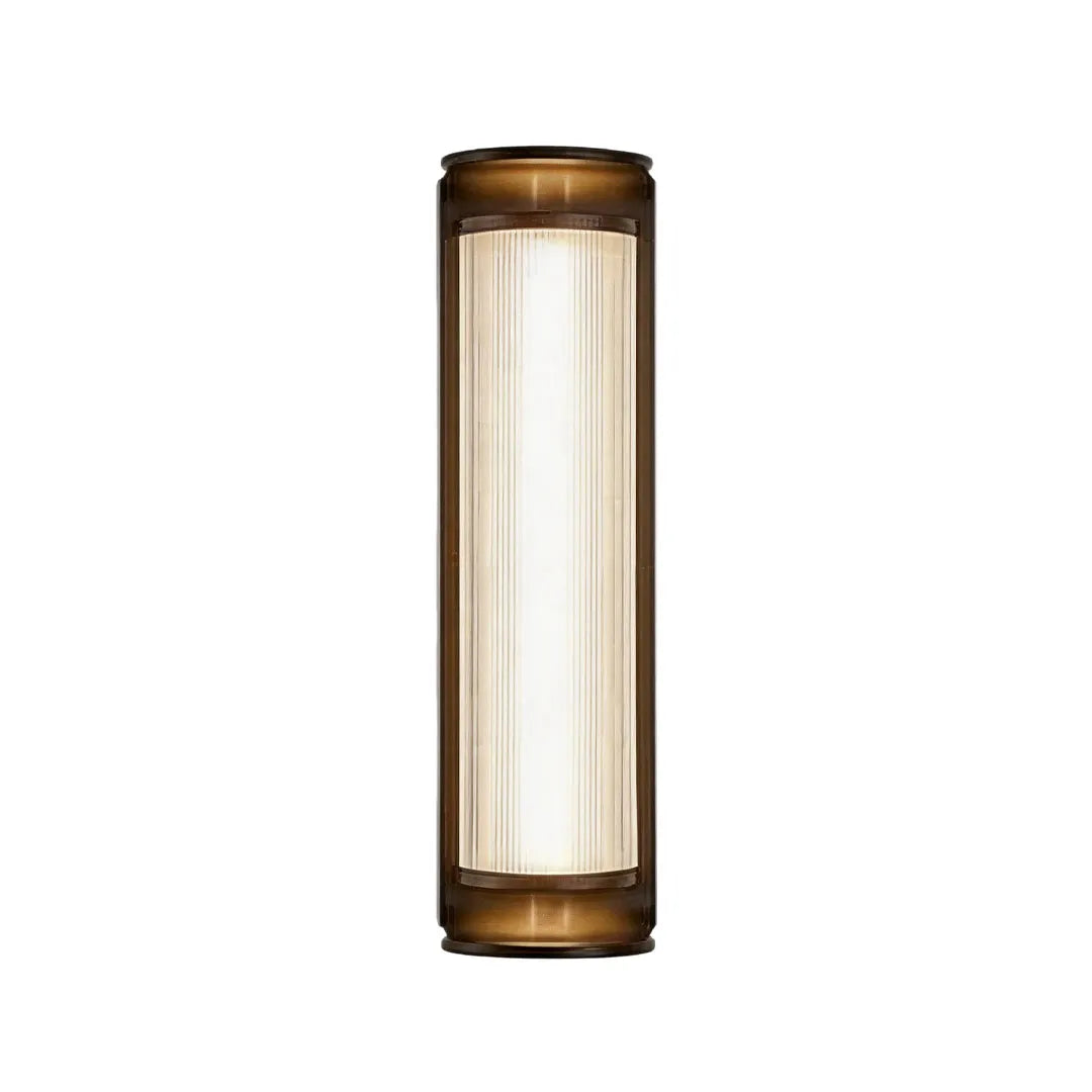 LED outdoor wall sconces with a tall cylindrical profile and warm ambient lighting.