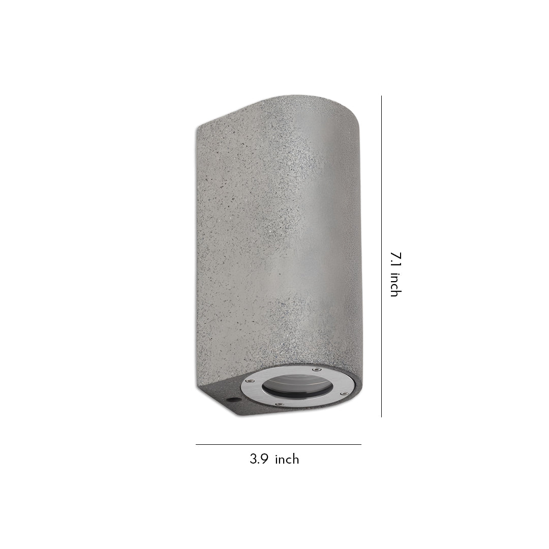 Modern cylindrical exterior fixture providing up down wall lights with a textured grey finish.