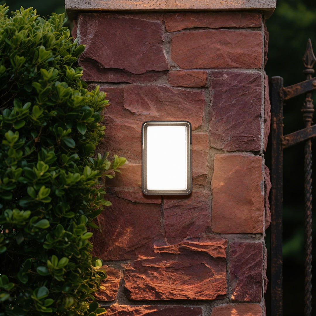 Cylindrical white wall light with clean modern design for minimalist architectural applications