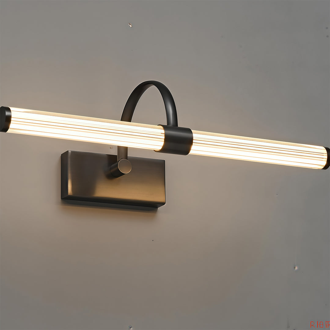 Dark bathroom vanity wall light displaying warm white LED illumination on neutral background.