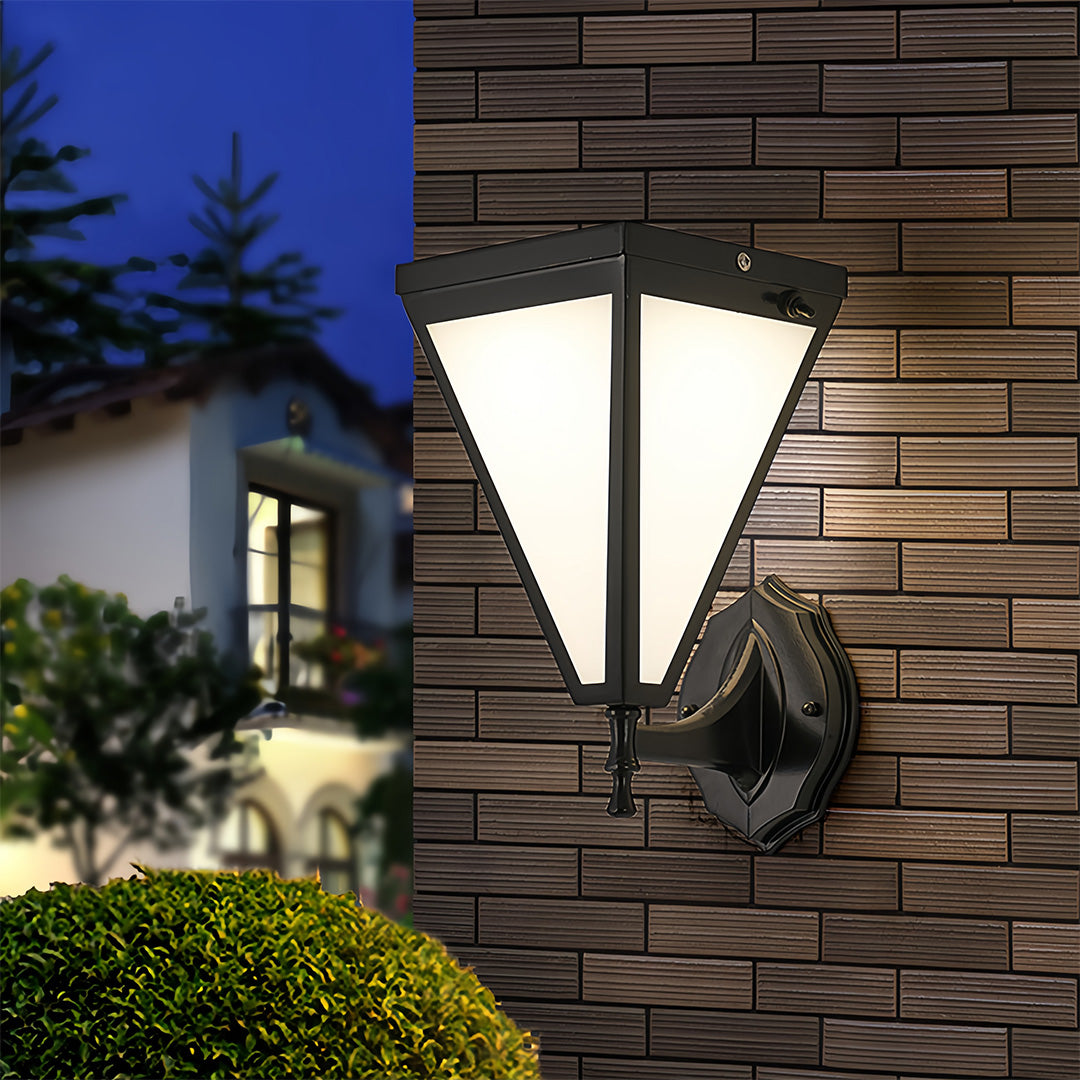 Outdoor solar lights wall mounted on dark brick wall with warm ambient glow.