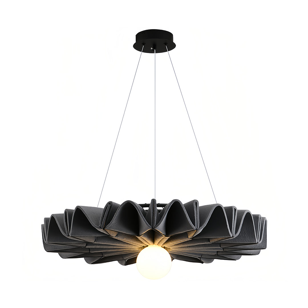 Full view of the dark charcoal cloth chandelier on a white background with strong light source 