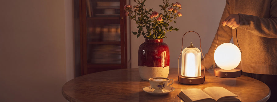 A warm Dazuma table lamp styled for lighting gifts