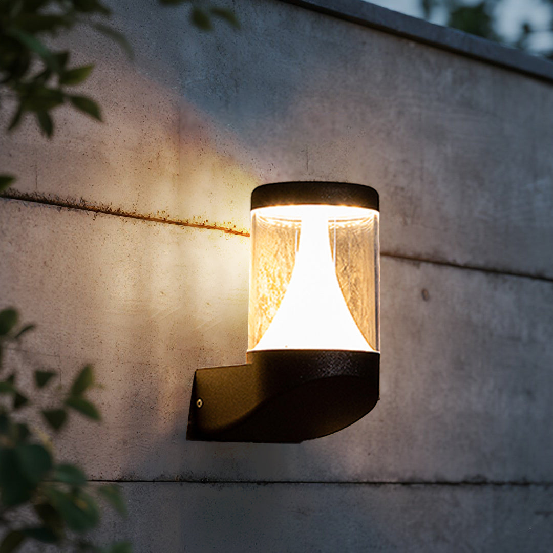 Round black recessed light fixture with visible LED module and chrome accents