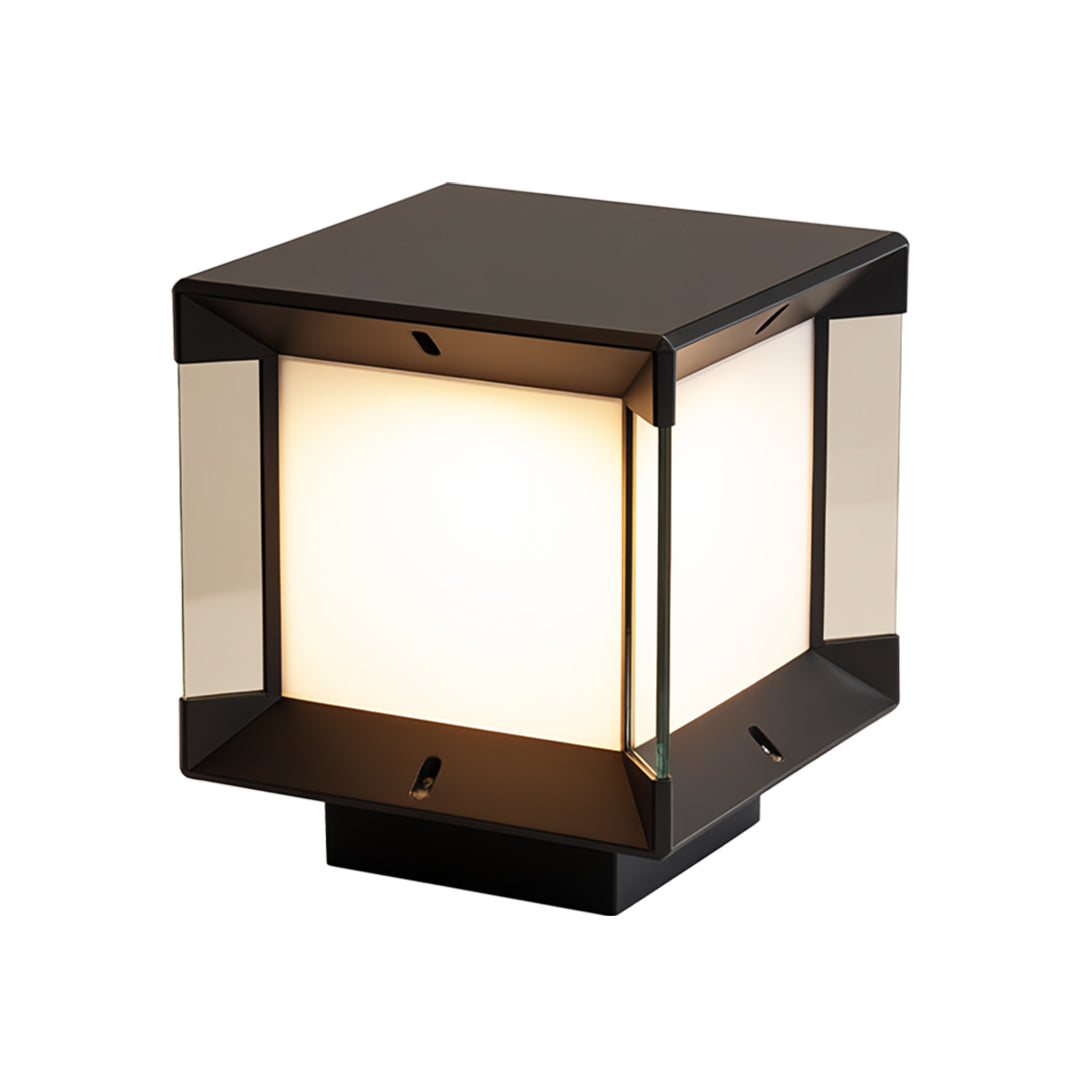 Pillar lights outdoor modern placed on a wooden deck railing with warm ambiance.